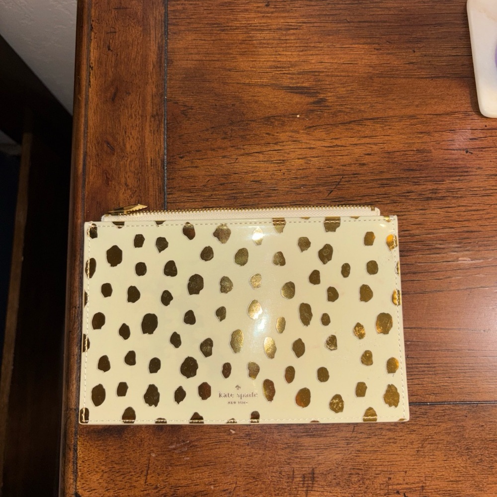 kate spade Cream Pouch with Metallic Gold Spot Print